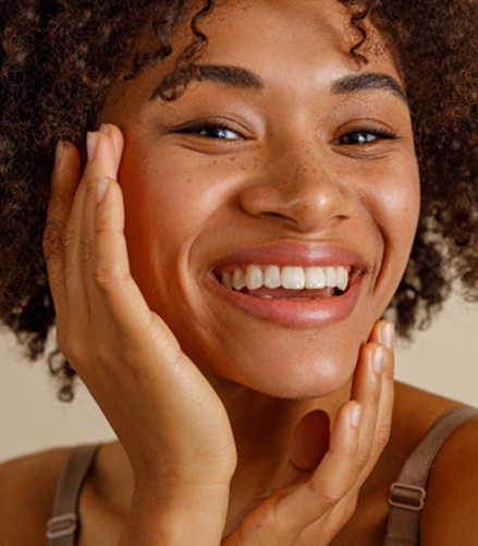 Closeup of woman with white teeth smiling