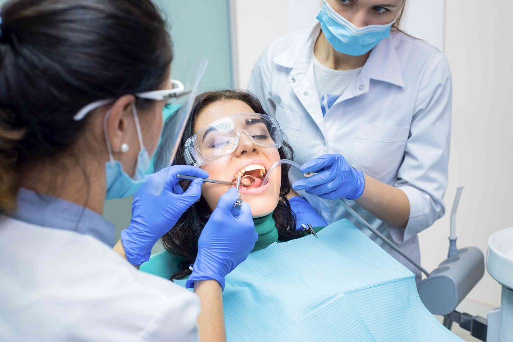 Woman getting dental treatment